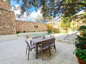 sun loungers and pool view