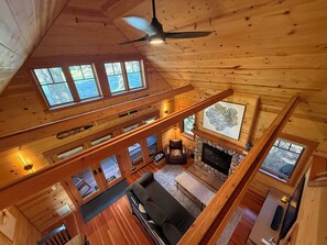 An open-lofted ceiling above the main living space.