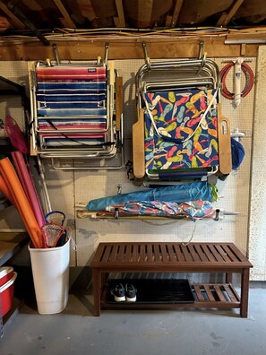 Plenty of beach supplies for the family! Includes several beach chairs, 3 umbrellas, a cooler, toys, and a wagon (not shown) for a fun day in the sun.