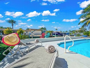 Take a refreshing dip in the pool while soaking in stunning waterfront views!