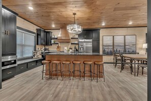 Open living and dining space with warm, inviting layout.