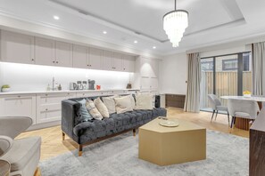 🛋️ Open-plan living with full kitchen