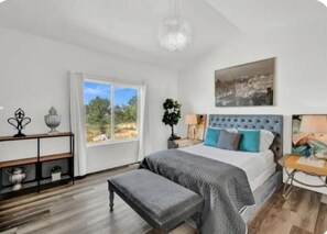 Stunning master bedroom with private master bathroom and walk in-closest, & tv