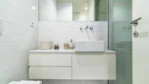 Spotless bathroom with sleek finishes, a walk-in shower, and premium amenities. Fresh towels provided for your comfort.
#ModernBathroom #SpaFeel