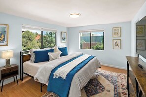 King suite bedroom has Roku tv