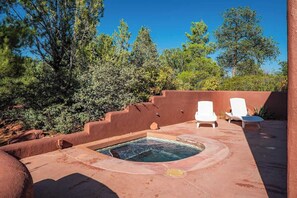 Relax and unwind in your private hot tub.