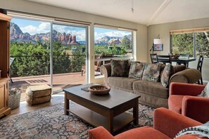 Relax in the spacious living room with stunning Red Rock views.