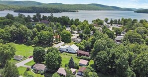 Aerial view. Schroon Lake Beach is just beyond the row of trees.