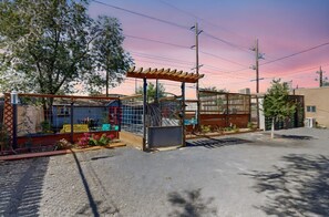 Entrance to the unit -- private fenced yard with locked gate.