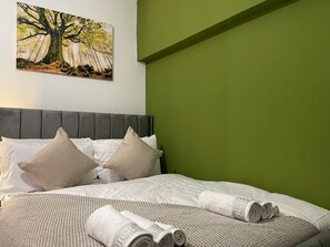 A relaxing space with comfortable furnishings, perfect for a peaceful night’s rest.