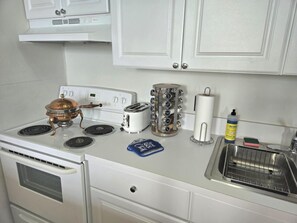 Kitchen with Stove and Over