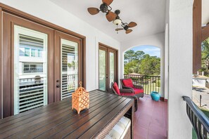 Balcony with two seatings perfect for relaxation.