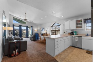Open-concept layout connecting kitchen, dining, and living areas for easy entertaining.