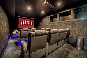 Your private movie theater - power reclining seats, big screen, wet bar/refrigerator and complimentary snacks.