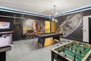Star Wars Themed games room with billiards and air hockey