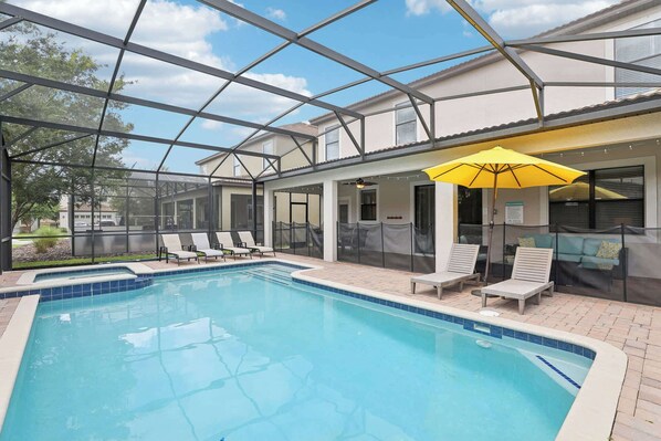 Private swimming pool and sun loungers