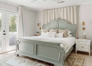 MAIN HOUSE - Bedroom with king bed and attached deck (1 of 2)