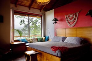 Soft linens, huge picture window. King bed and full day bed /  window seat
