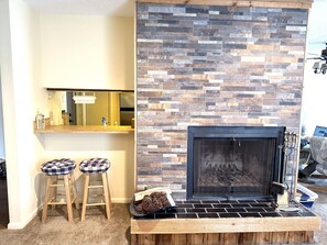Condo fireplace in living room