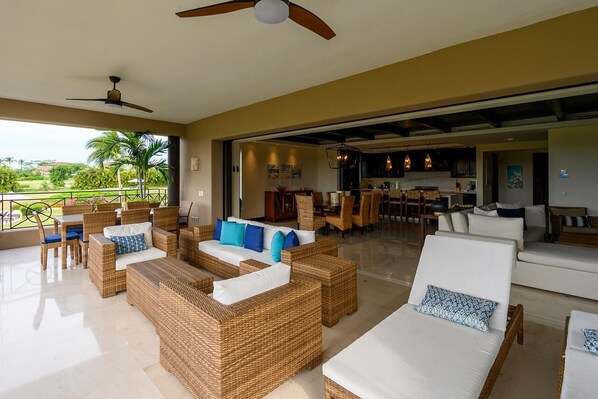 Relax on your private terrace overlooking the pool