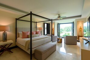 Golf Course-view master bedroom with king-size bed
