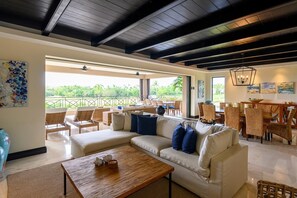 Open living space with panoramic golf course views

