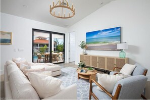 Kick back after beach days—your cozy, coastal living room awaits