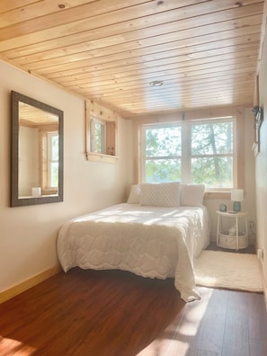 Upstairs full bed overlooking the pond