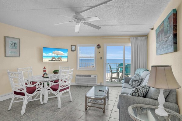 Living Room area with access to private balcony
