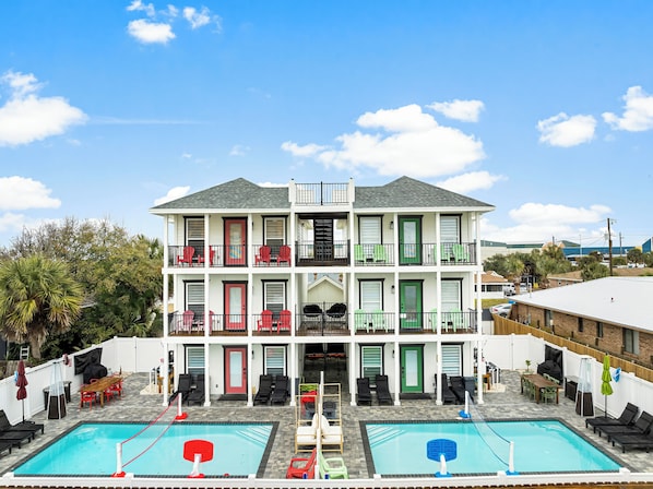 Double the fun! Two vibrant beach homes with pools, game rooms & endless thrills