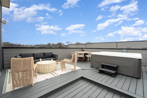 4th Floor: Private rooftop patio with outdoor seating, outdoor dining with space for 6 guests, and a hot tub.