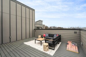 3rd Floor: Rooftop patio with outdoor seating and 2 dining areas each with seating for up to 4 guests.