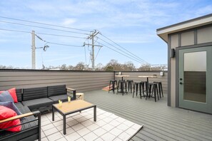 3rd Floor: Rooftop patio with outdoor seating and 2 dining areas each with seating for up to 4 guests.