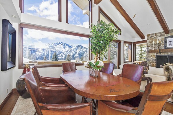 Dine in & your eyes may never leave the mnt. Auto-shades cut the intense sun!