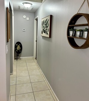 Stylish and well-lit hallway with modern decor.