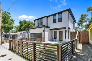 Modern elegance with warm wood accents—your dream home awaits! 