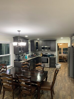 Dining table and kitchen