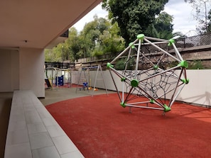 Enjoy a safe and fun outdoor play area for kids, perfect for family vacations! Spacious and inviting, just steps from your rental.