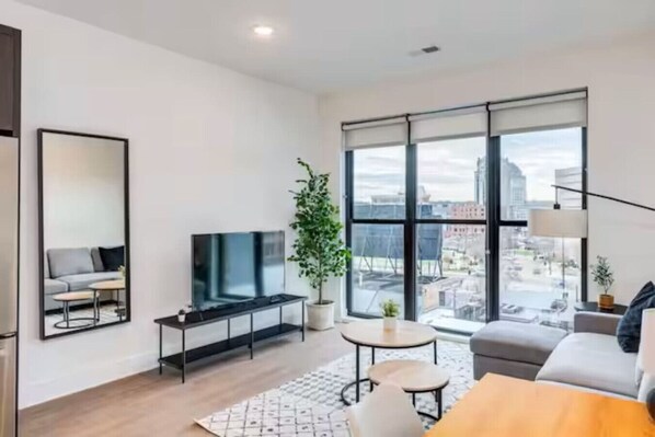 As you take a seat in the living room, the comfortable furniture and tasteful design make it easy to unwind.