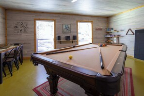 Unleash your competitive side with family & friends in the game room!