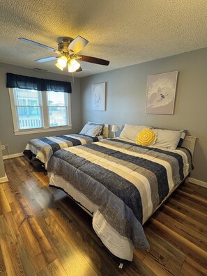 Front bedroom with queen and twin (photo 1).