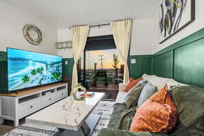 Lay back on plush sofas while streaming your favorite shows on the smart TV