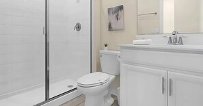 Convenient shared bathroom with all essentials for a refreshing stay.