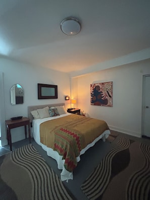 Bedroom with a queen sized bed.