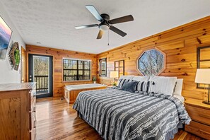 Primary bedroom on the main level (Bedroom 1) with King Bed and jacuzzi!