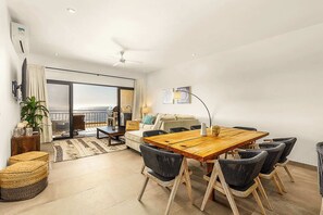 The spacious living room is the perfect place to gather with friends and family.