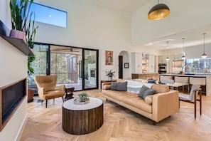 Kick back in a cozy living room with plenty of seating for everyone.