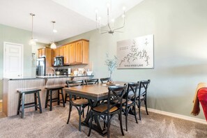 Make mealtime memories together in Unit 330’s elegant dining area