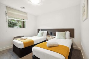 Bright and peaceful twin room, perfect for friends or kids.