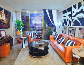 Take in iconic views from your living room as it opens into a 24th-story terrace